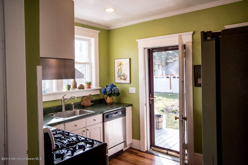 89 Pinckney Road Red Bank, NJ 07701 - Photo 7 of 26 a kitchen with stainless steel appliances granite countertop a refrigerator and a sink