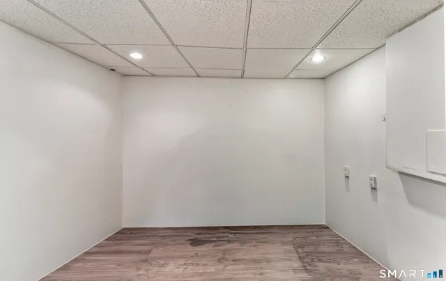 a room with two washing machine and storage