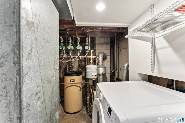 a buildings covered with tall trees