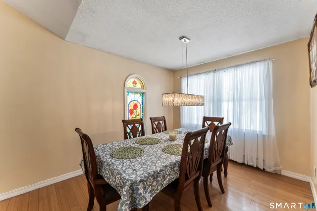 a bed room with furniture and window