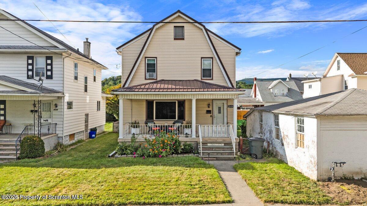 2129 Comegys Avenue Scranton, PA 18509 - Photo 1 of 22 a front view of house with yard