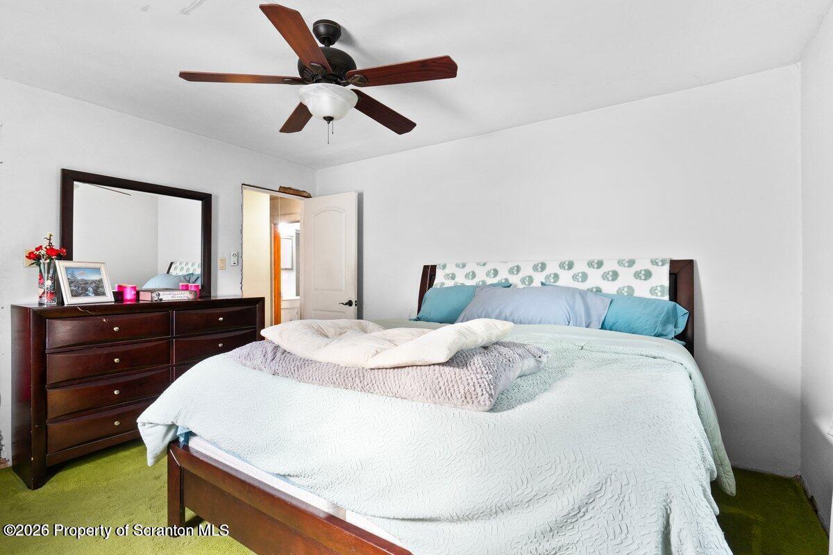 2129 Comegys Avenue Scranton, PA 18509 - Photo 13 of 22 a bedroom with a bed and a dresser