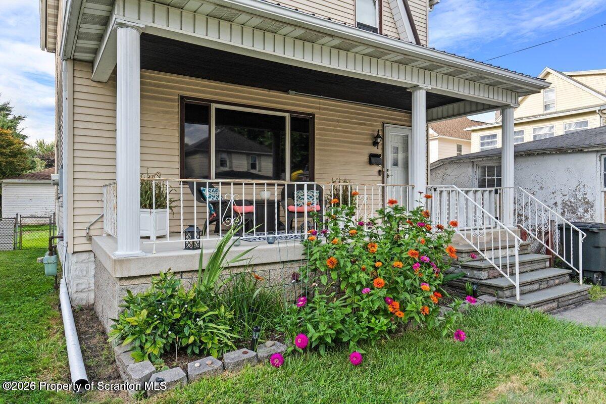 2129 Comegys Avenue Scranton, PA 18509 - Photo 4 of 22 a view of a house with fountain in the yard
