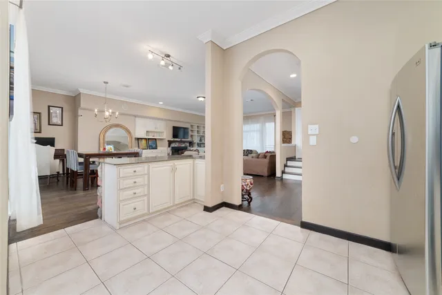 a view of living room with furniture and flat screen tv