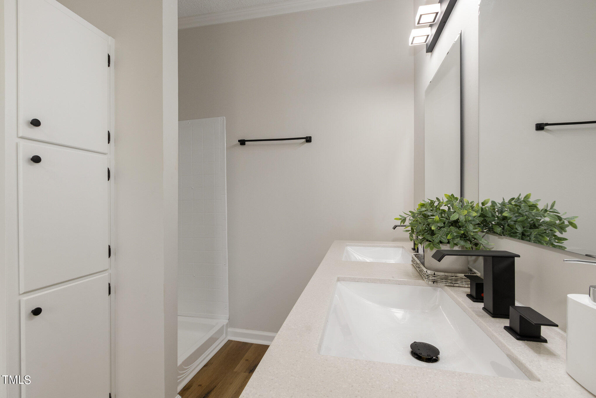 1183 Diamond Hills Road Stem, NC 27581 - Photo 18 of 28 a bathroom with a sink and a tub