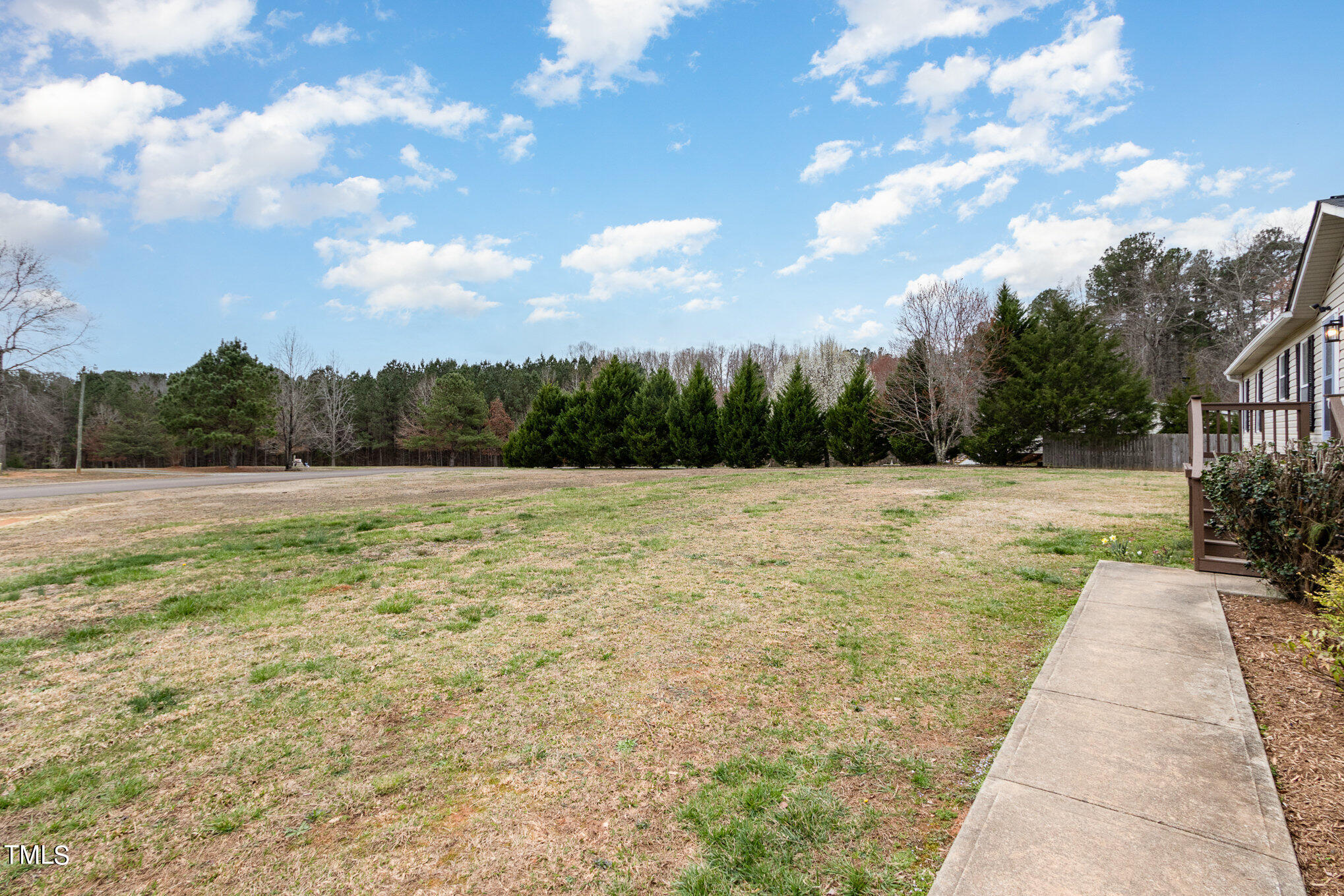 1183 Diamond Hills Road Stem, NC 27581 - Photo 26 of 28 a view of swimming pool with a yard