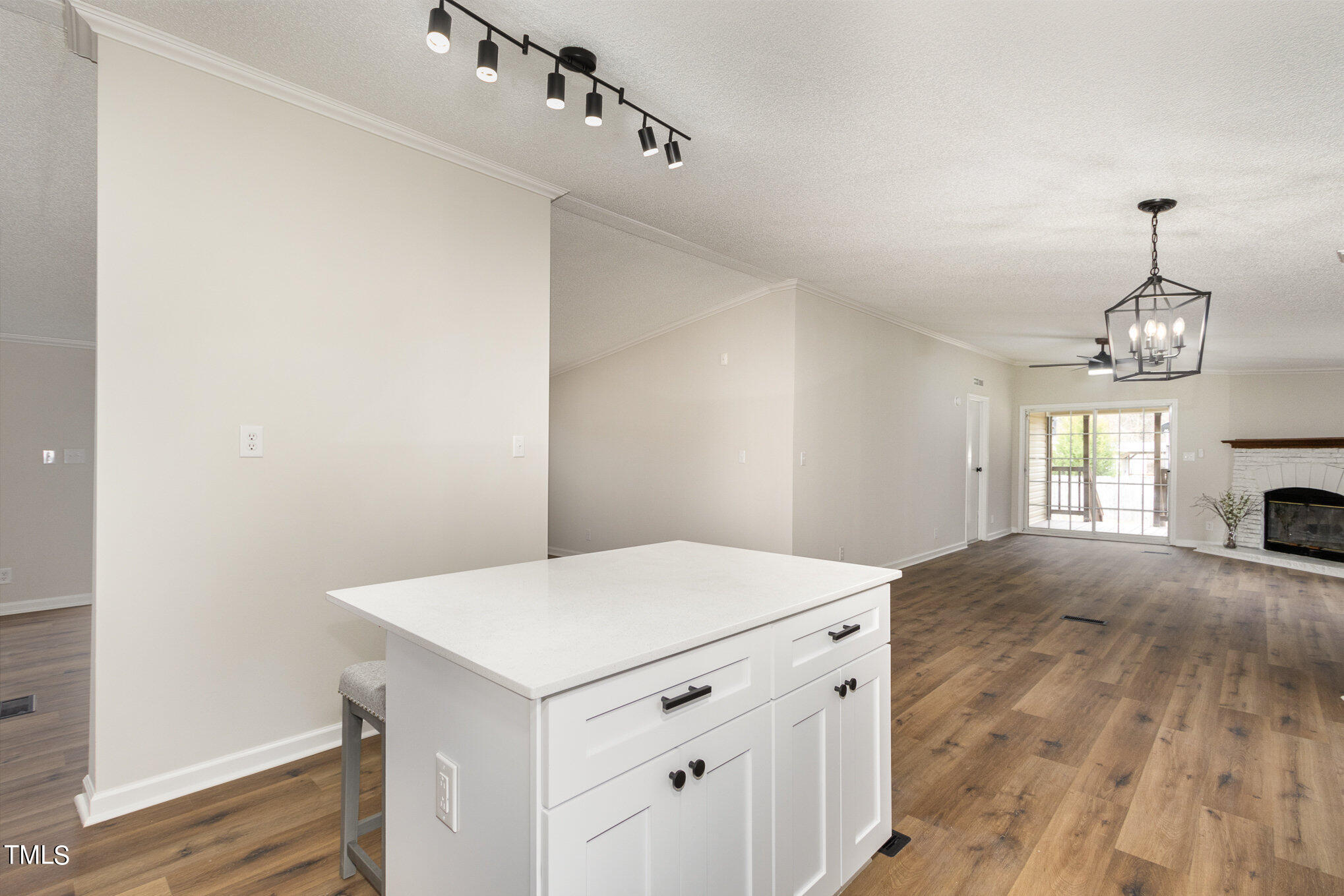 1183 Diamond Hills Road Stem, NC 27581 - Photo 9 of 28 a view of an empty room with window and wooden floor