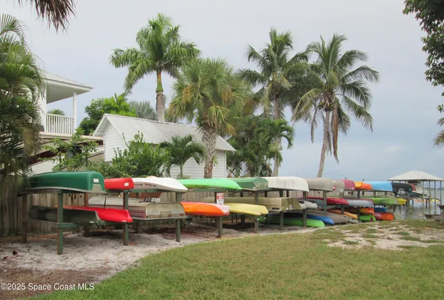 a childrens park with lots of swings and slides