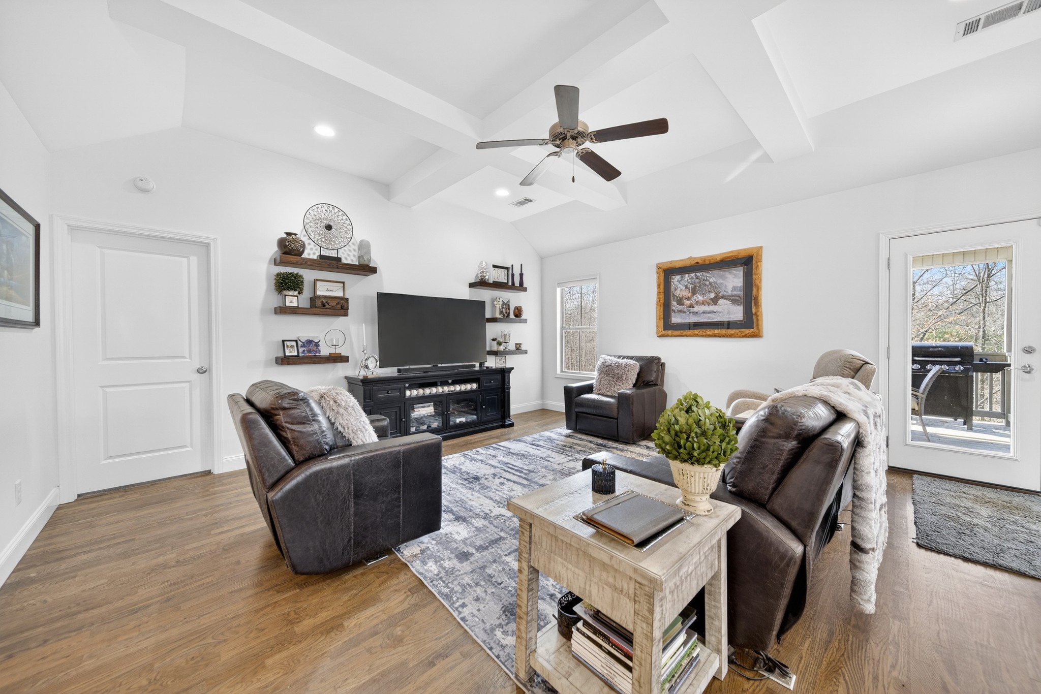 6716 Old Highway 431 Springfield, TN 37172 - Photo 12 of 58 a living room with furniture a ceiling fan and a flat screen tv