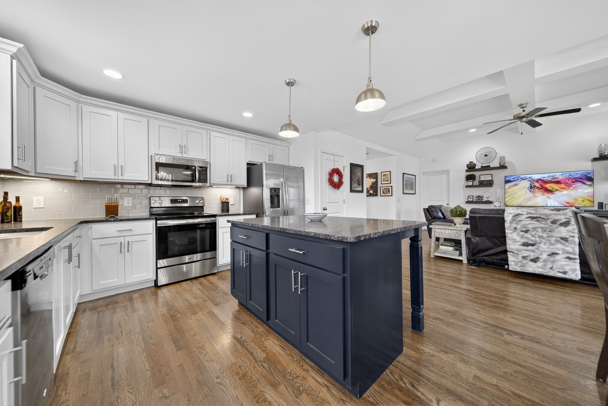 6716 Old Highway 431 Springfield, TN 37172 - Photo 25 of 58 a large kitchen with stainless steel appliances granite countertop a stove oven and a refrigerator