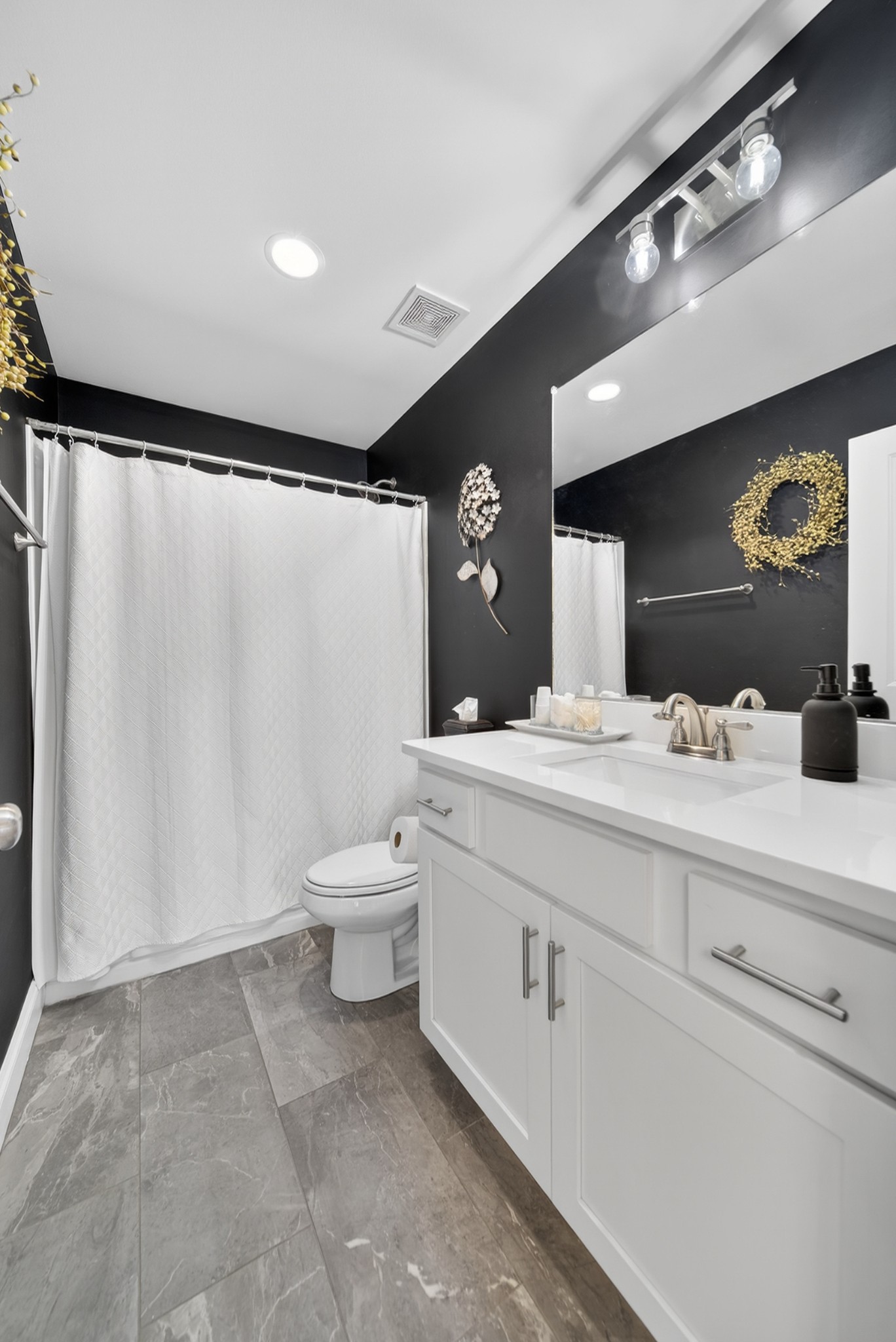 6716 Old Highway 431 Springfield, TN 37172 - Photo 38 of 58 a bathroom with a double vanity sink toilet and a mirror