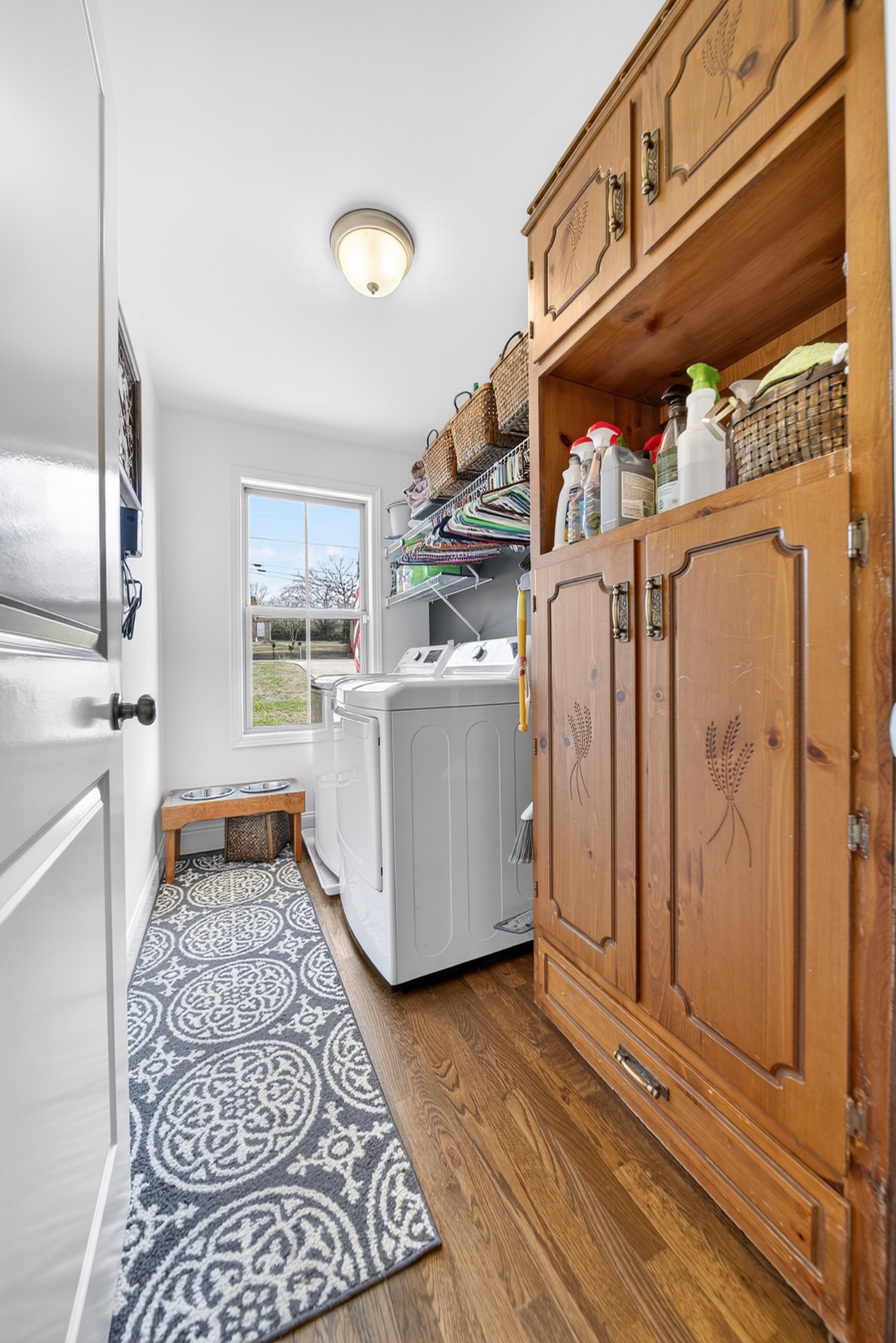 6716 Old Highway 431 Springfield, TN 37172 - Photo 43 of 58 a kitchen with stainless steel appliances granite countertop a refrigerator a stove and a sink with wooden floor