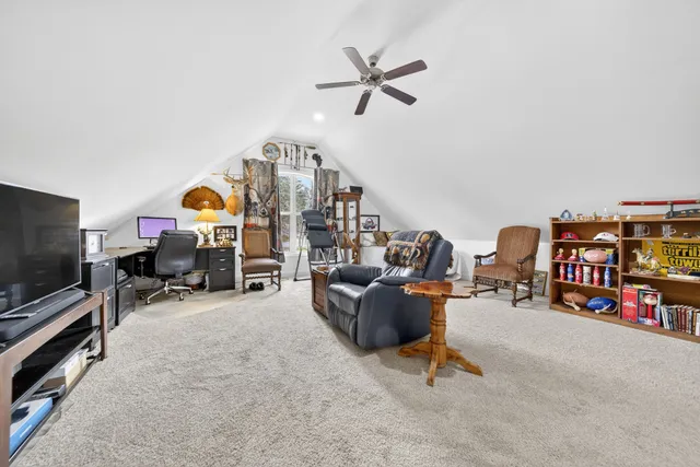 a view of a house next to a yard