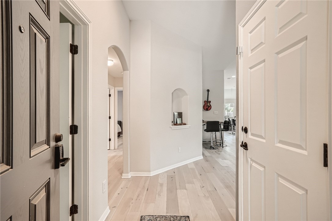 7108 Hester Road Austin, TX 78725 - Photo 2 of 25 a view of a bathroom with a tub and shower