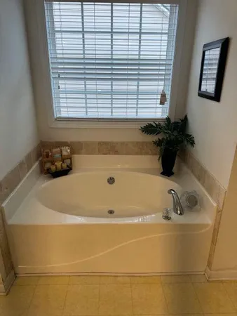 a bathroom with a bathtub