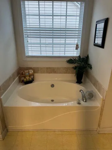 a bathroom with a bathtub