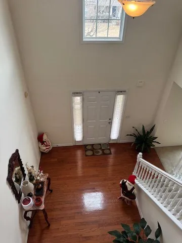 a room with furniture and wooden floor