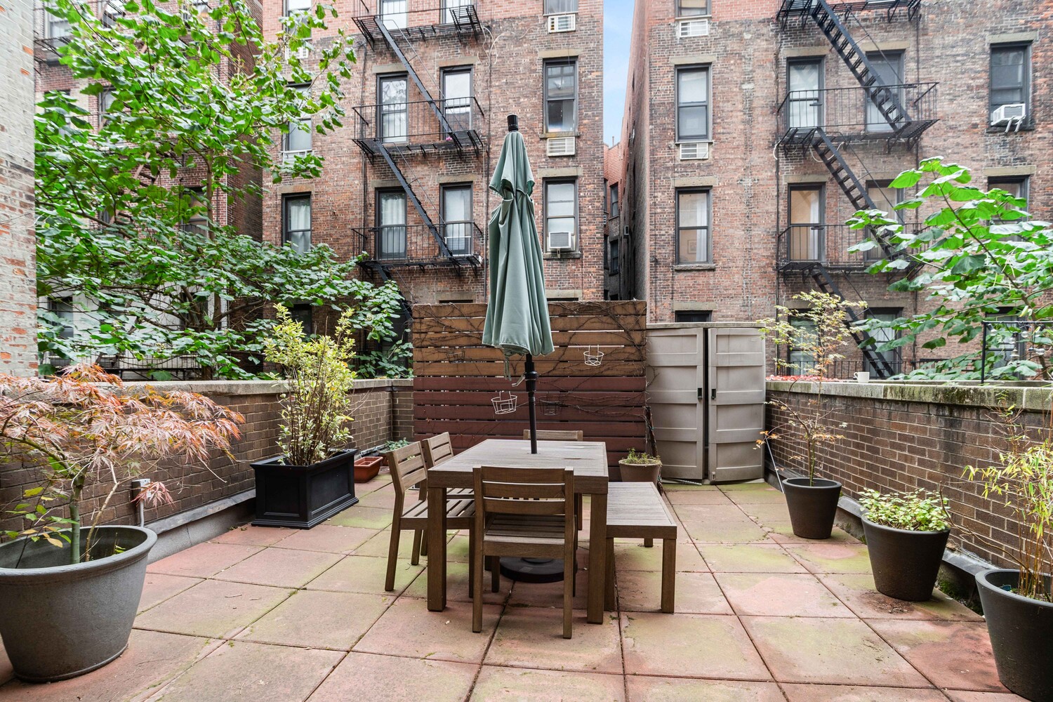 225 East 86th Street, Unit 204 Manhattan, NY 10028 - Photo 12 of 17 a view of a patio with couple of chairs