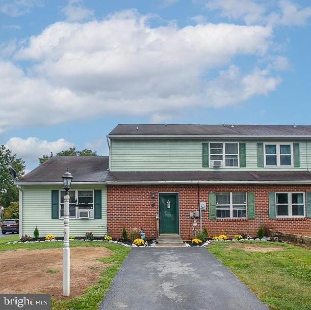 3 Winding Way Lititz, PA 17543 - Photo 1 of 34 a front view of a house with a yard and garage