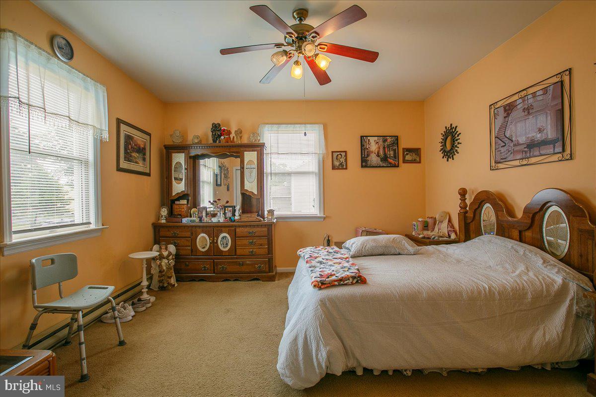 3 Winding Way Lititz, PA 17543 - Photo 17 of 34 a bedroom with a bed and ceiling fan