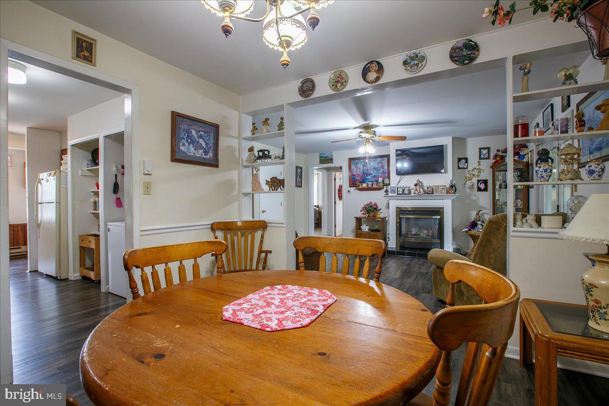 3 Winding Way Lititz, PA 17543 - Photo 7 of 34 a living room with furniture a dining table and kitchen view