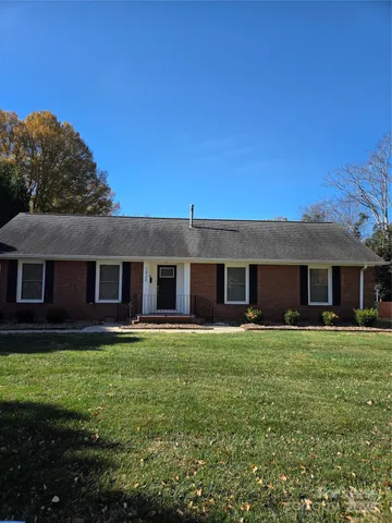 a house view with a garden space