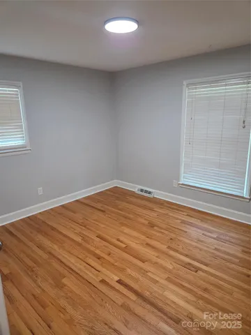 a bathroom with a sink toilet and mirror