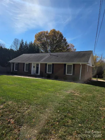 a house view with a garden space