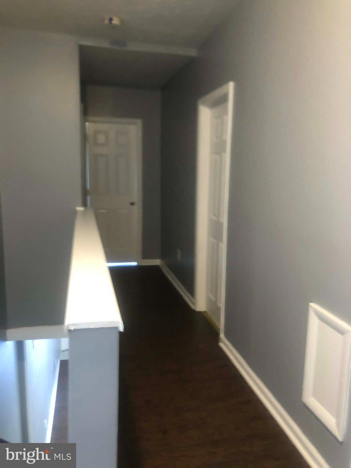 2671 St Benedict Street Baltimore, MD 21223 - Photo 12 of 21 Inviting hallway with modern charm.