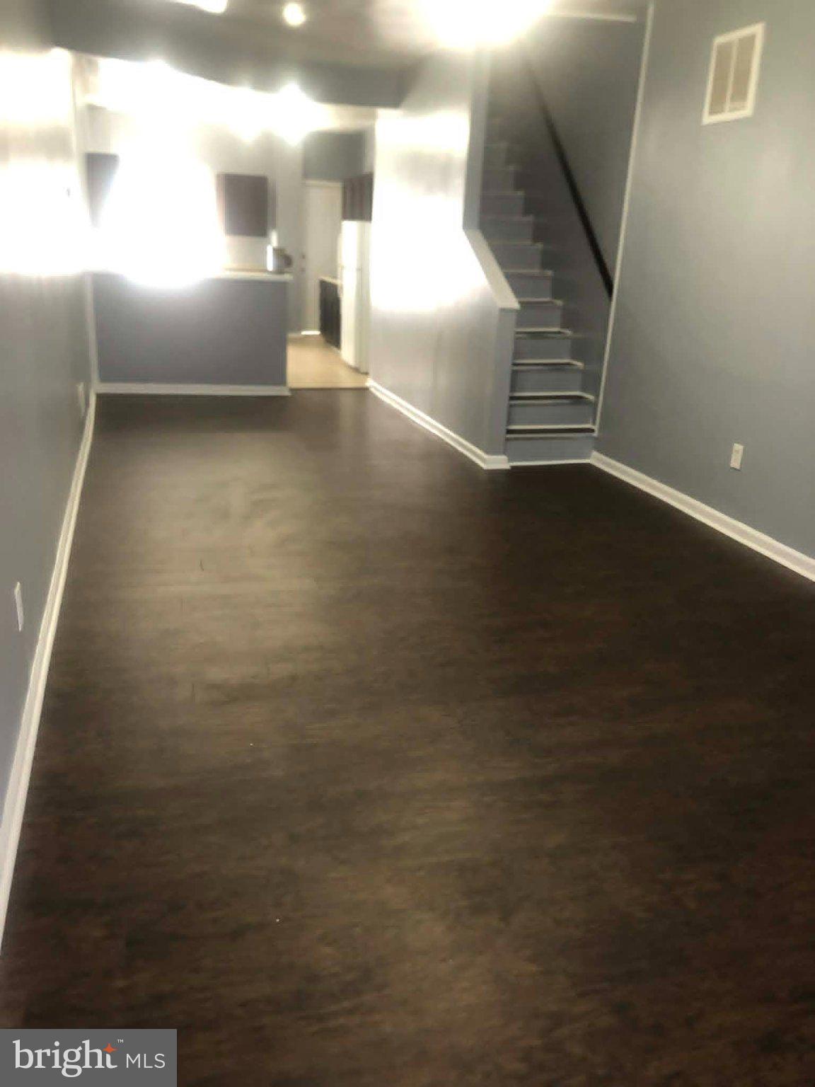2671 St Benedict Street Baltimore, MD 21223 - Photo 2 of 21 Spacious, modern living area awaits you.