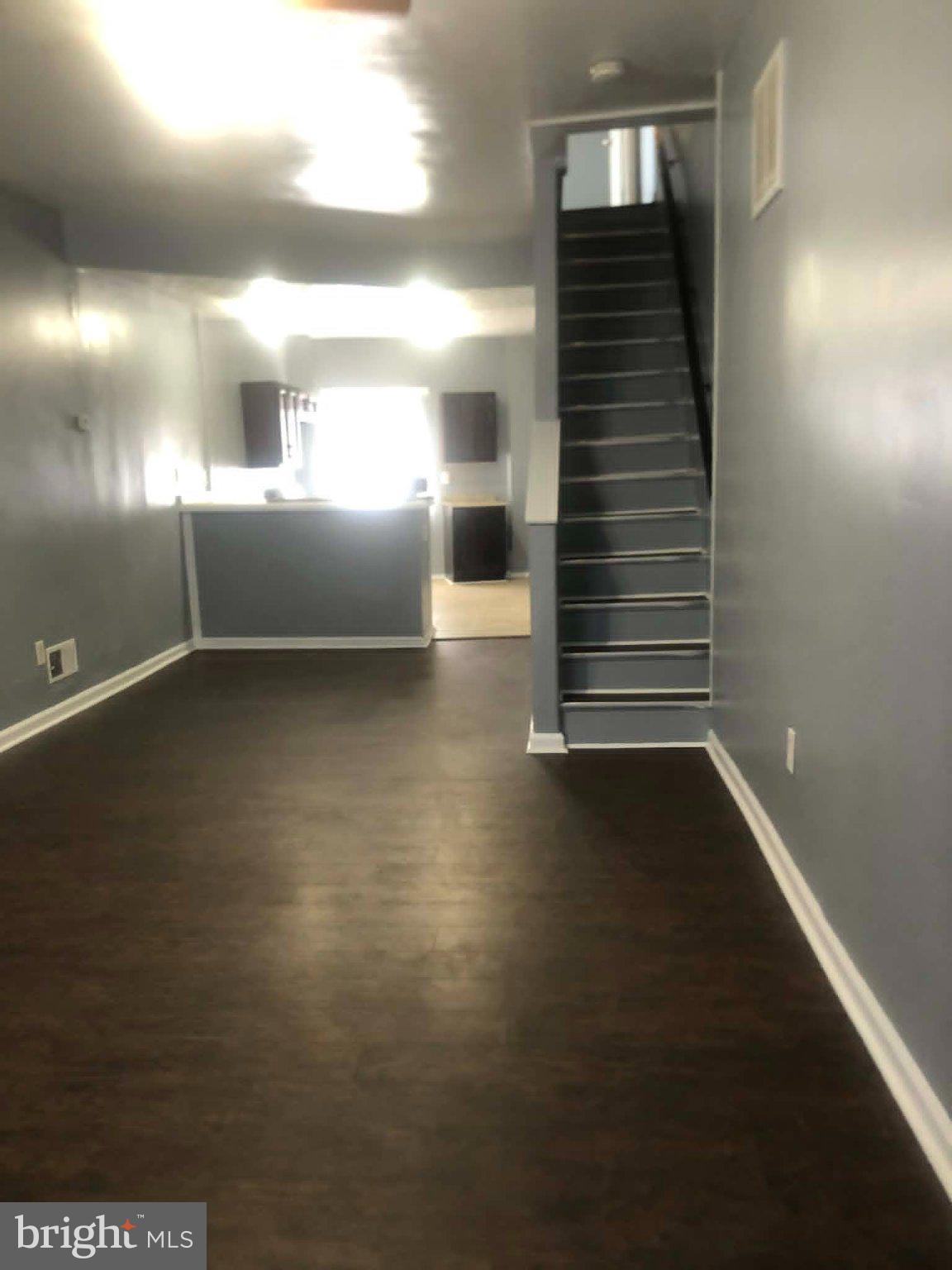 2671 St Benedict Street Baltimore, MD 21223 - Photo 3 of 21 Spacious entryway with modern charm.