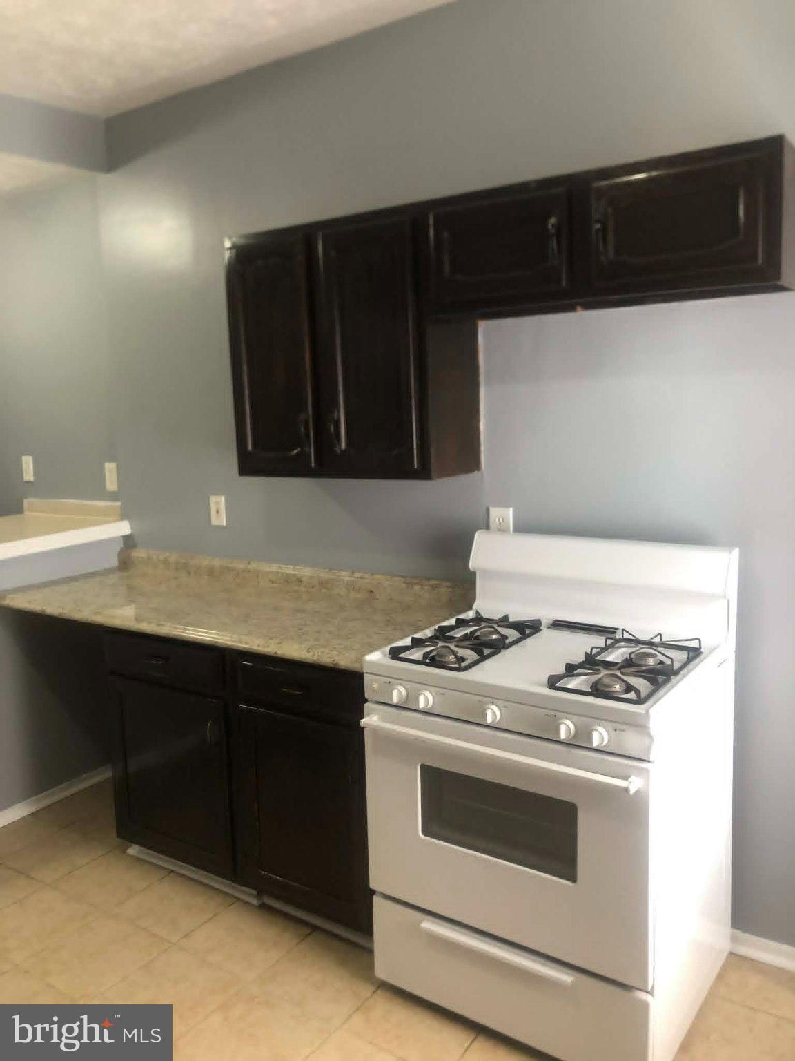 2671 St Benedict Street Baltimore, MD 21223 - Photo 6 of 21 Modern kitchen with sleek finishes.