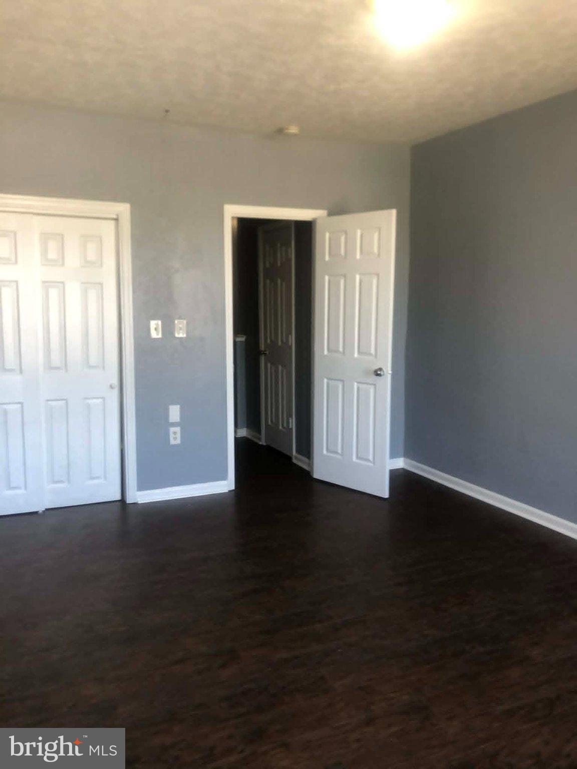 2671 St Benedict Street Baltimore, MD 21223 - Photo 9 of 21 Spacious room with versatile layout.