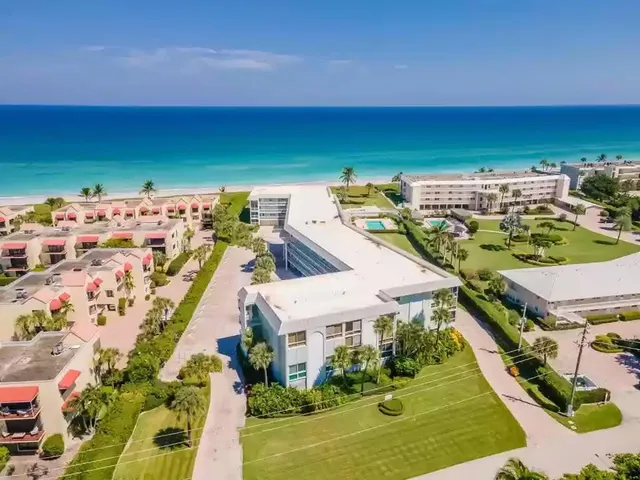 an aerial view of a house with a garden
