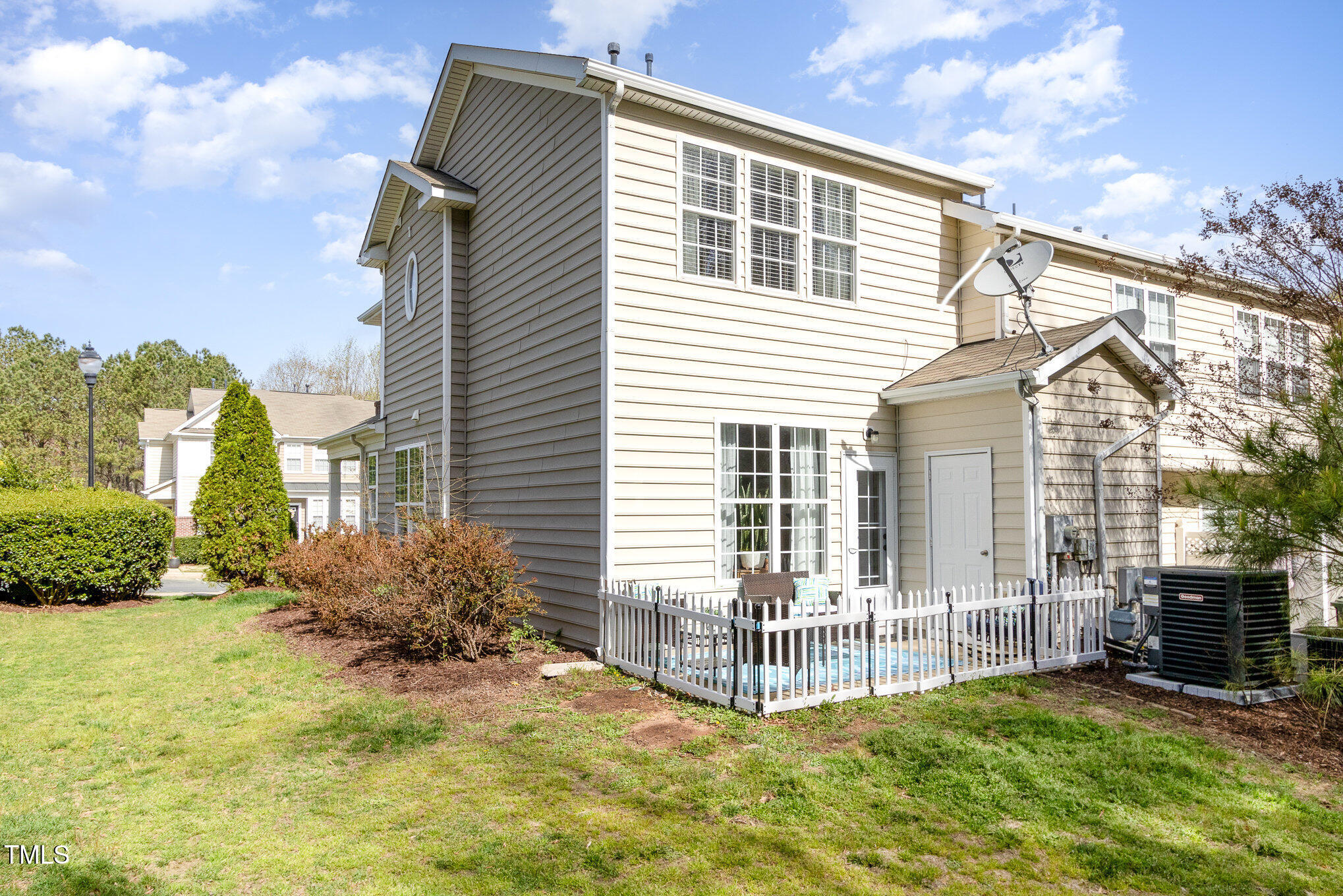 7621 Satinwing Lane Raleigh, NC 27617 - Photo 20 of 23 a view of a house with a yard and porch