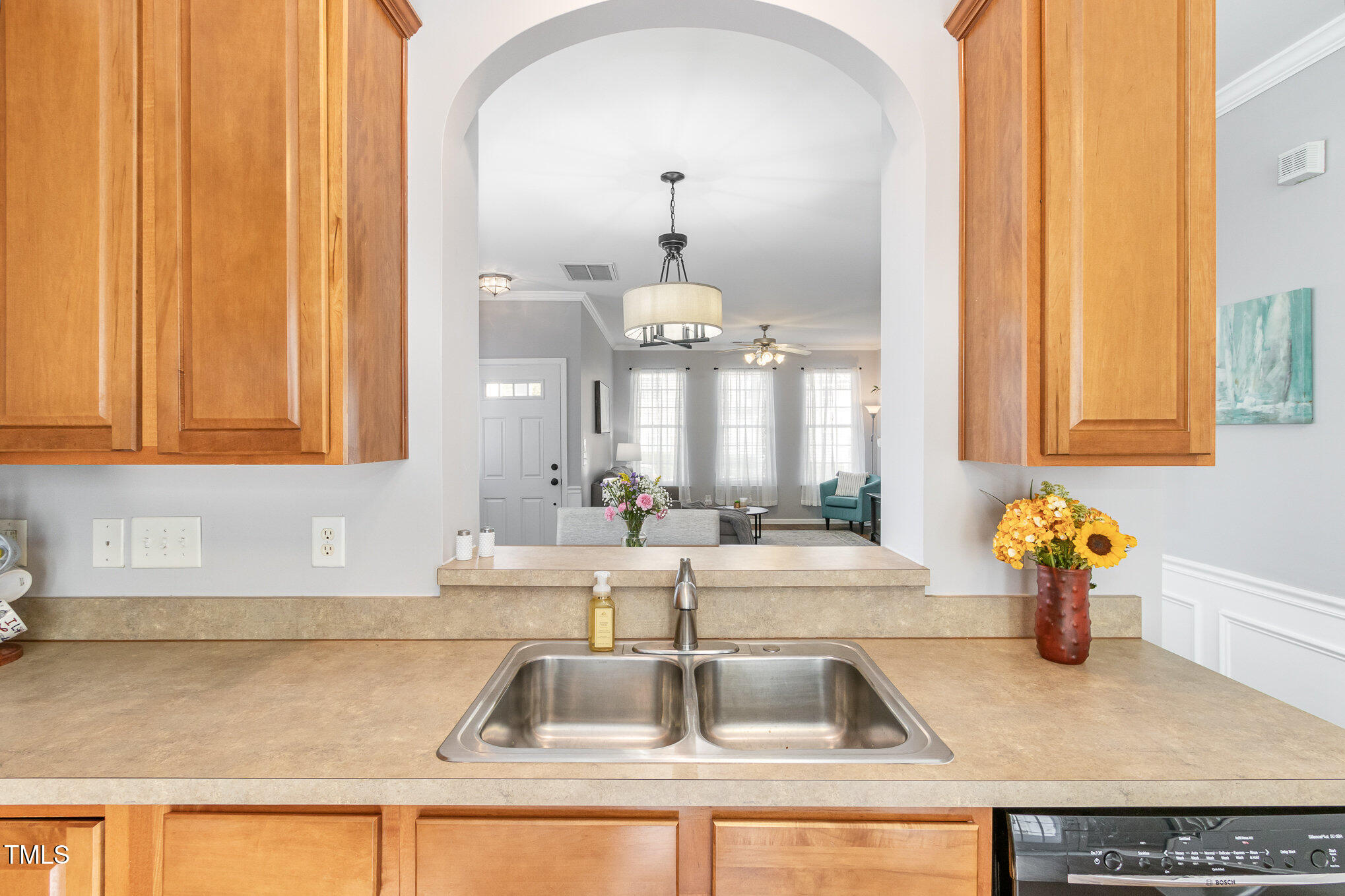7621 Satinwing Lane Raleigh, NC 27617 - Photo 9 of 23 a kitchen with sink and cabinets