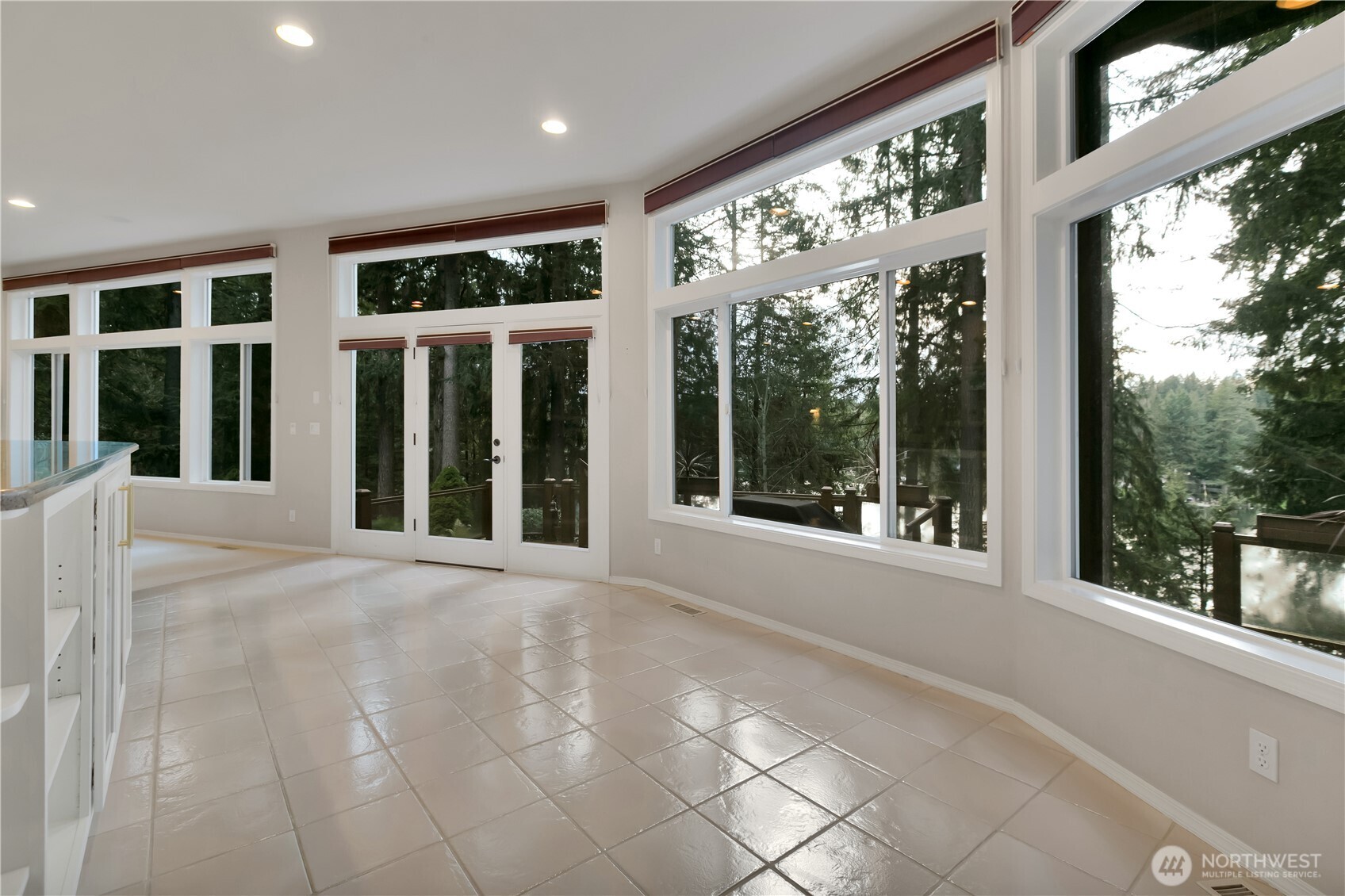 25305 Southeast 232nd Street Maple Valley, WA 98038 - Photo 14 of 33 a view of a large window with an outdoor view