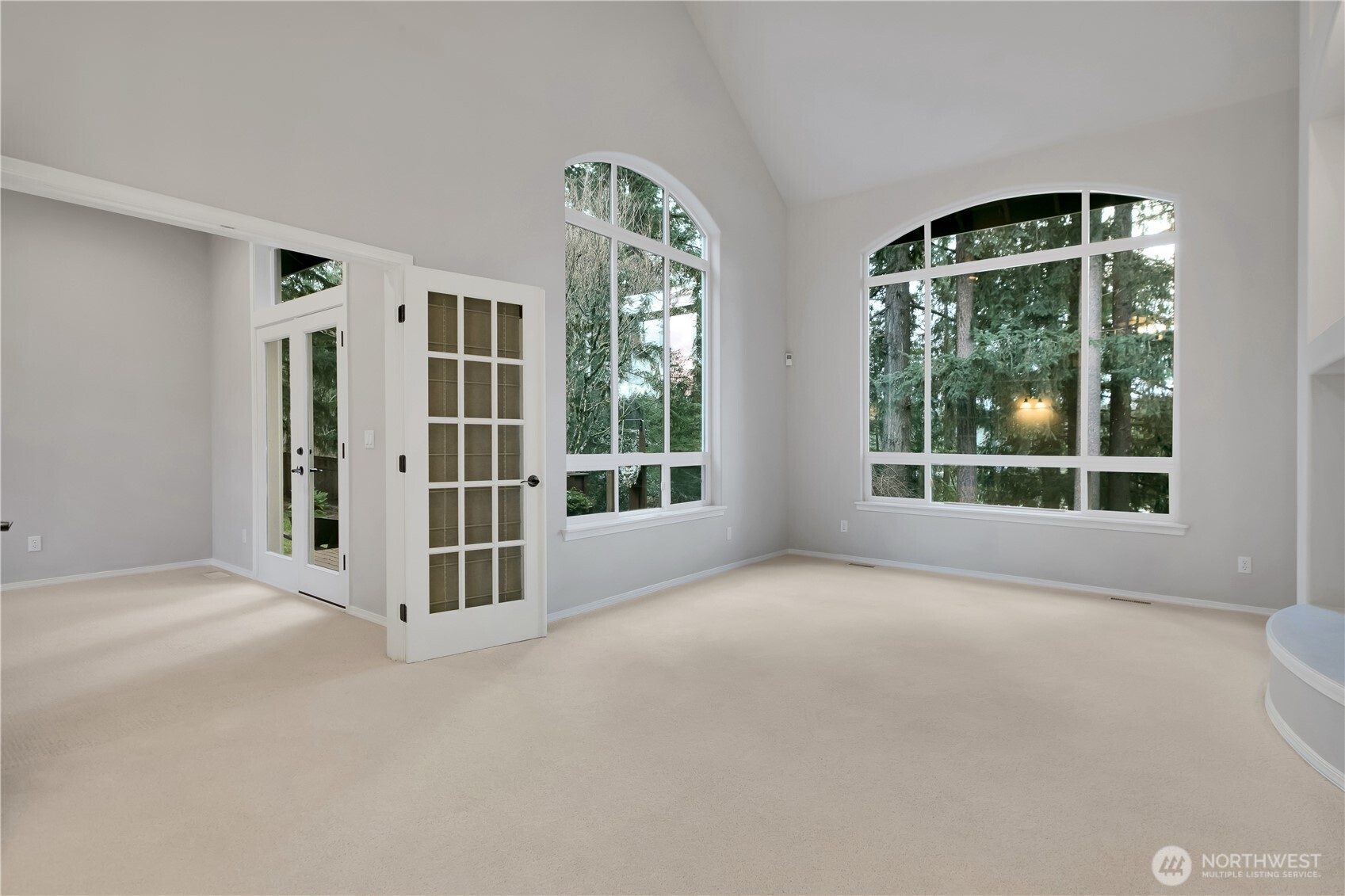 25305 Southeast 232nd Street Maple Valley, WA 98038 - Photo 18 of 33 a view of an empty room with a window