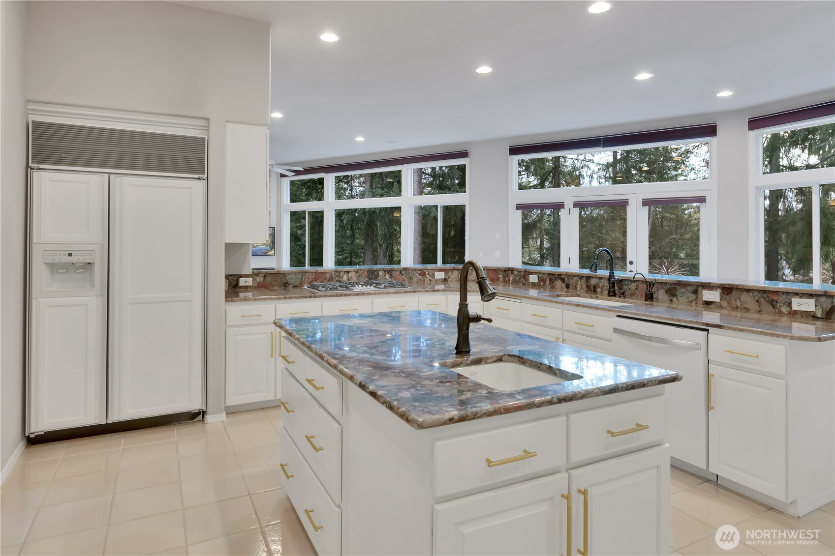 25305 Southeast 232nd Street Maple Valley, WA 98038 - Photo 27 of 33 a kitchen with counter top and windows