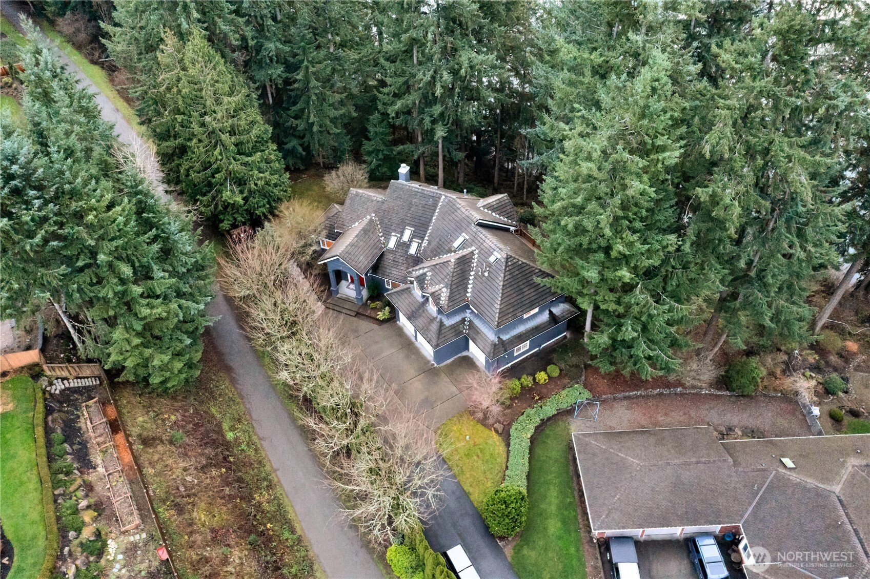 25305 Southeast 232nd Street Maple Valley, WA 98038 - Photo 31 of 33 an aerial view of a house with outdoor space