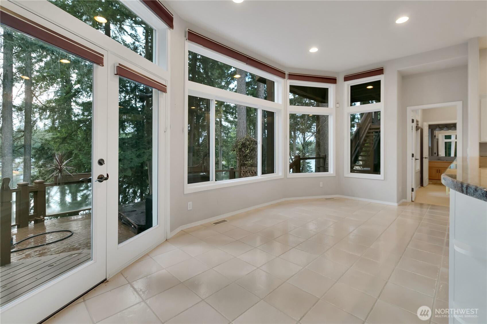 25305 Southeast 232nd Street Maple Valley, WA 98038 - Photo 4 of 33 a view of an entryway with an outdoor space