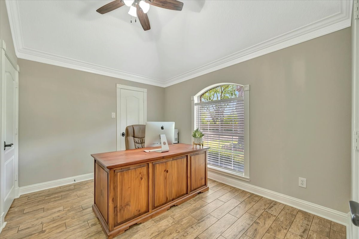 306 Sunset Ridge Drive League City, TX 77573 - Photo 11 of 50 a view of a room with a window and wooden floor