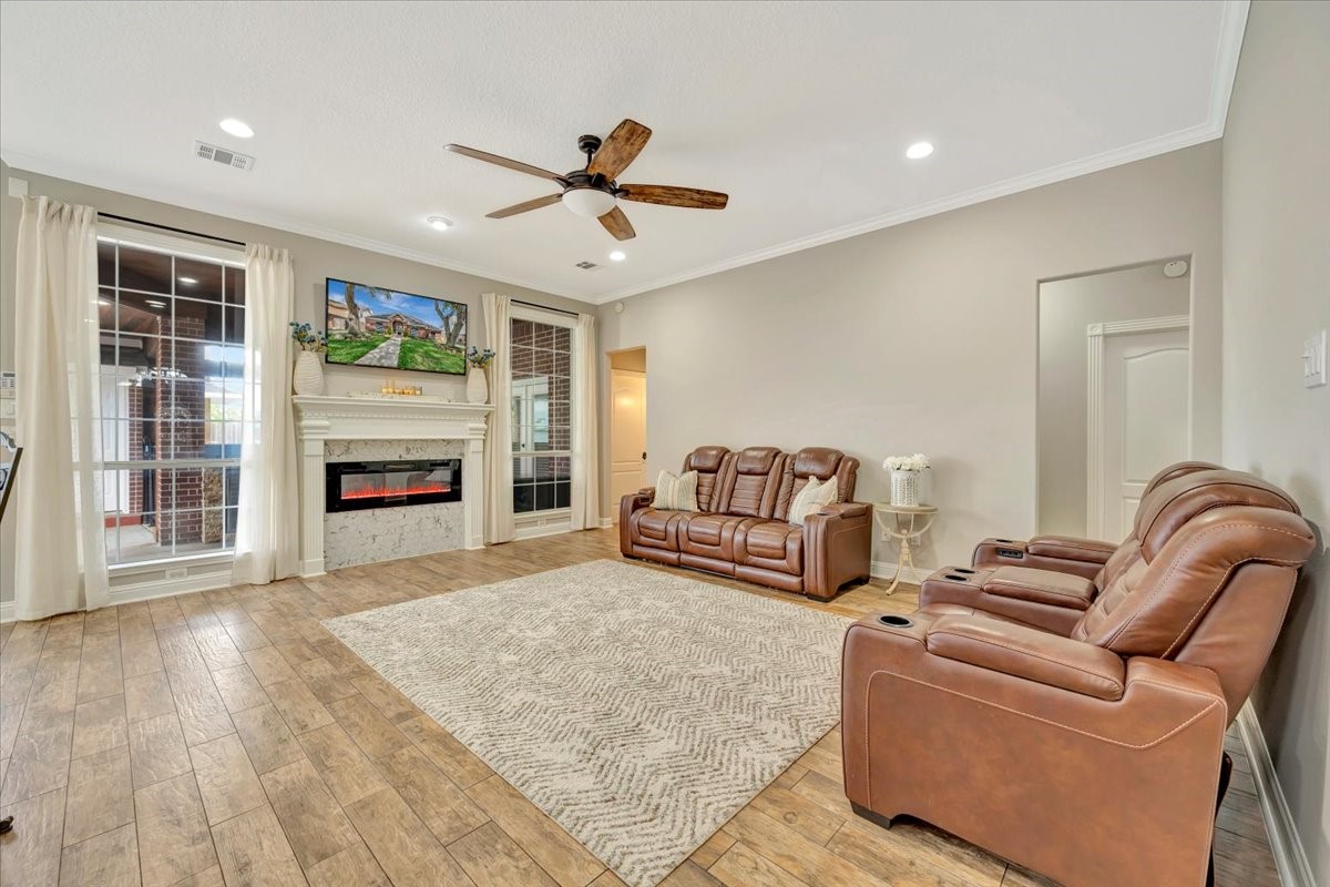 306 Sunset Ridge Drive League City, TX 77573 - Photo 14 of 50 a living room with furniture and a fireplace
