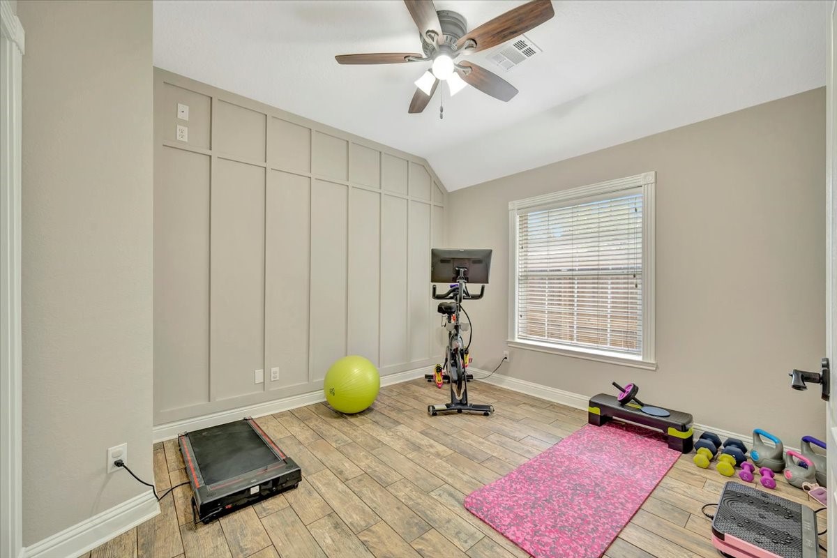 306 Sunset Ridge Drive League City, TX 77573 - Photo 29 of 50 a view of a workspace with furniture and a window