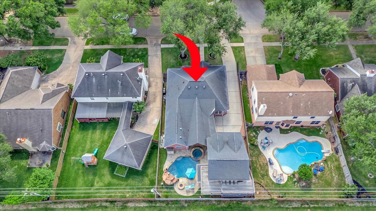 306 Sunset Ridge Drive League City, TX 77573 - Photo 48 of 50 an aerial view of multiple houses with outdoor space and swimming pool