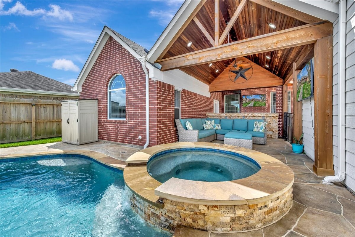 306 Sunset Ridge Drive League City, TX 77573 - Photo 5 of 50 a view of a house with swimming pool