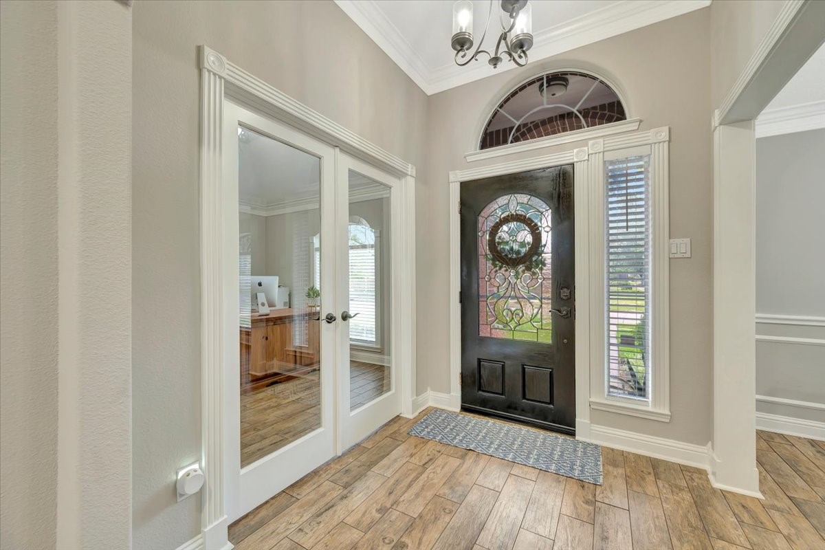 306 Sunset Ridge Drive League City, TX 77573 - Photo 9 of 50 a view of a entryway door of the house