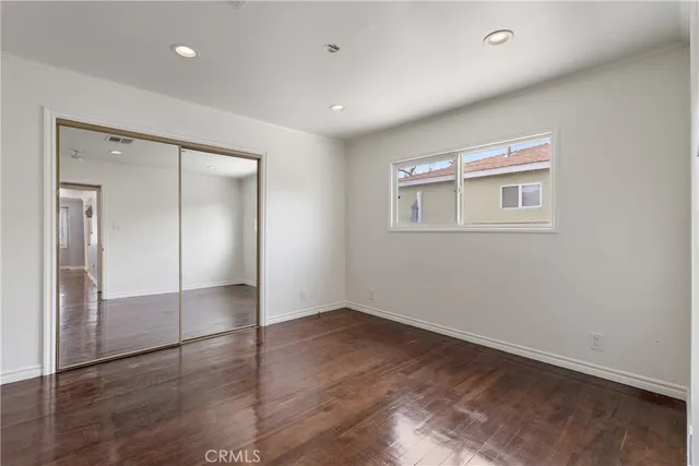 a kitchen with a sink cabinets and stainless steel appliances
