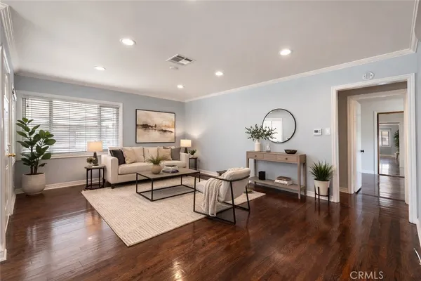 a kitchen with granite countertop a sink stove and refrigerator