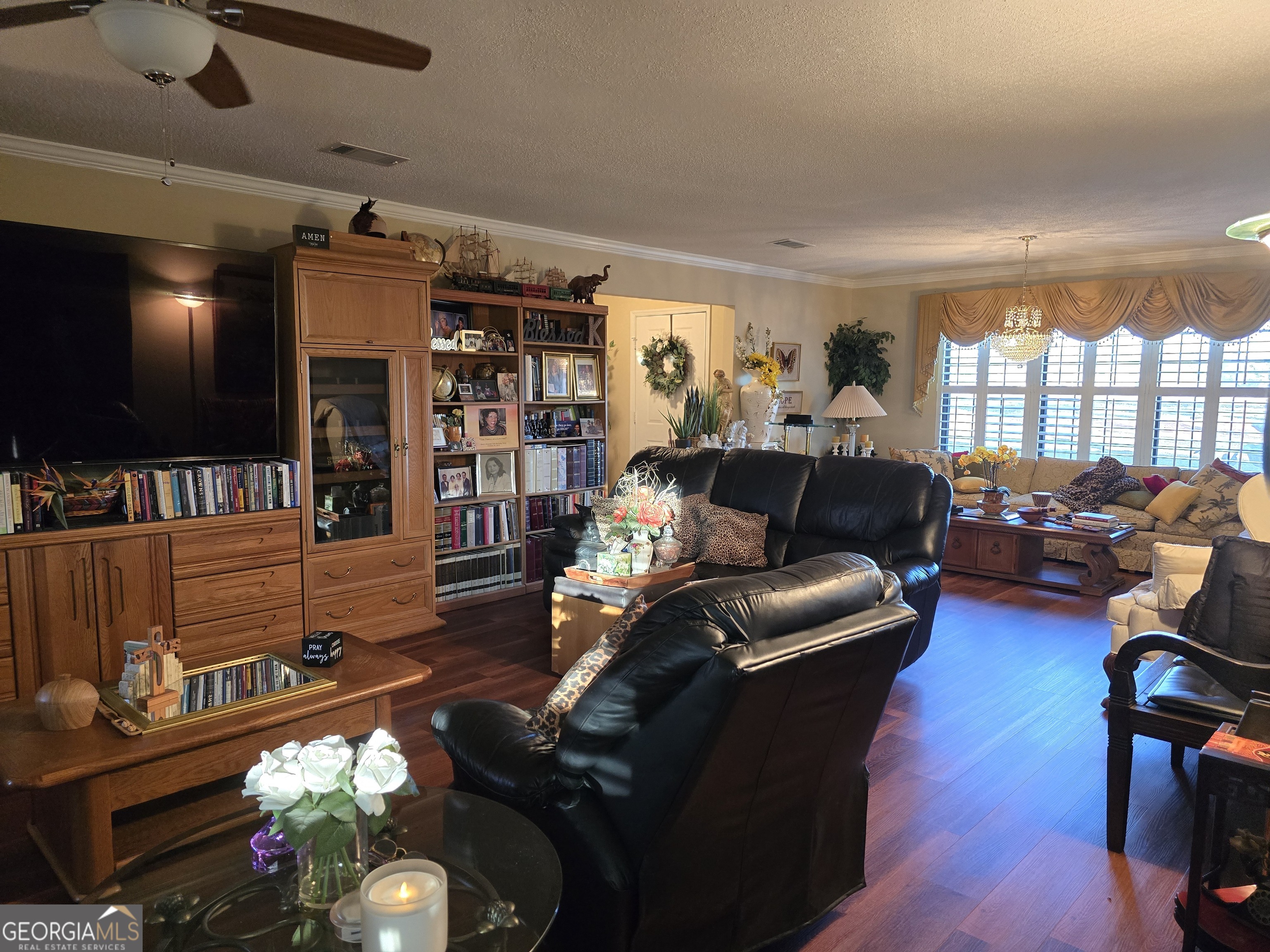 479 Mitchell Loop Bluffton, GA 39824 - Photo 19 of 51 a living room with furniture and a flat screen tv